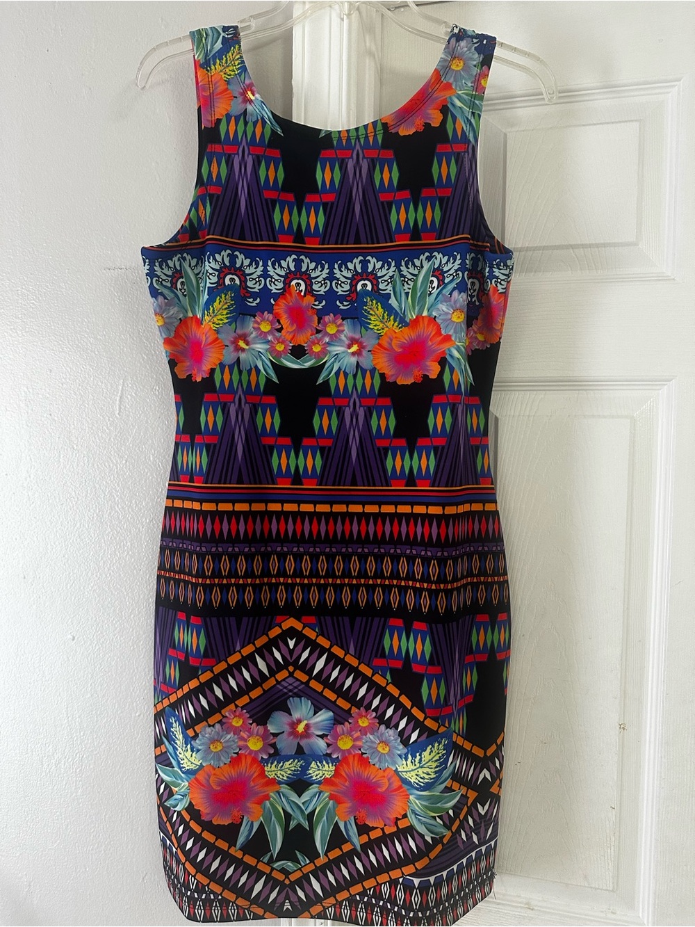 Sleeveless Black Sheath Dress with Vibrant Floral and Geometric Print